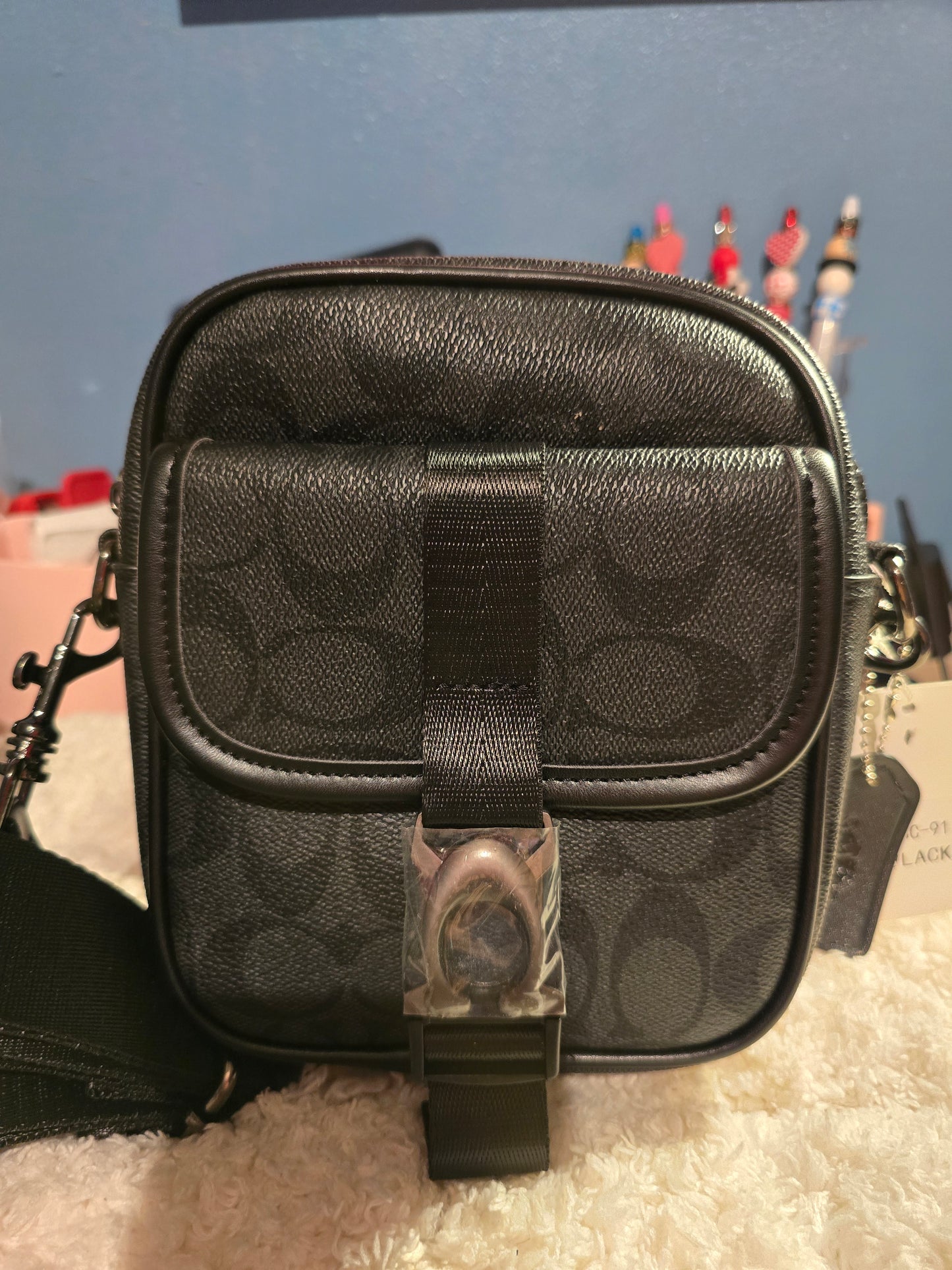 Cartera coach hombre