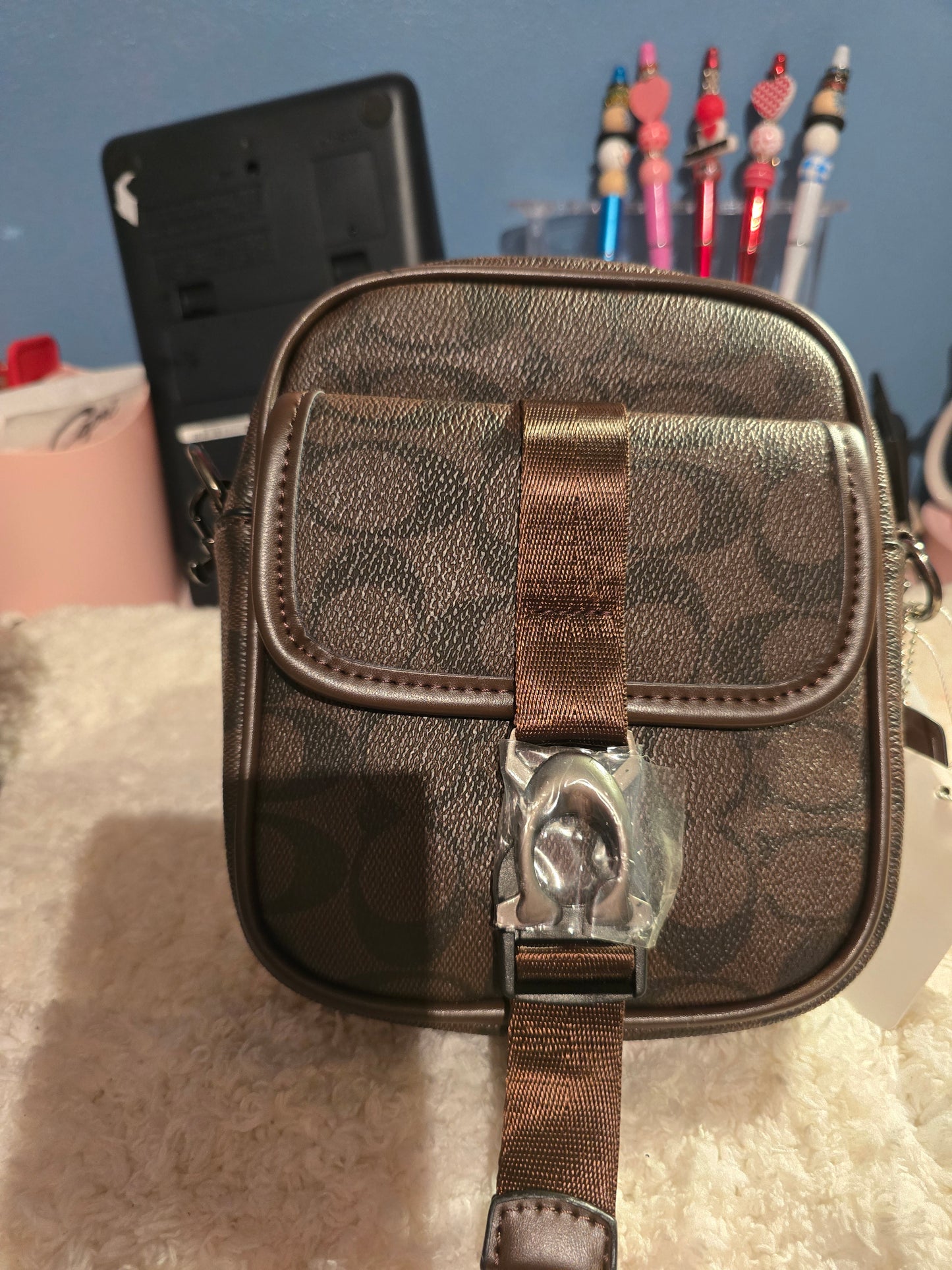 Cartera coach hombre