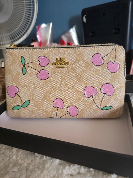 Cartera mano coach