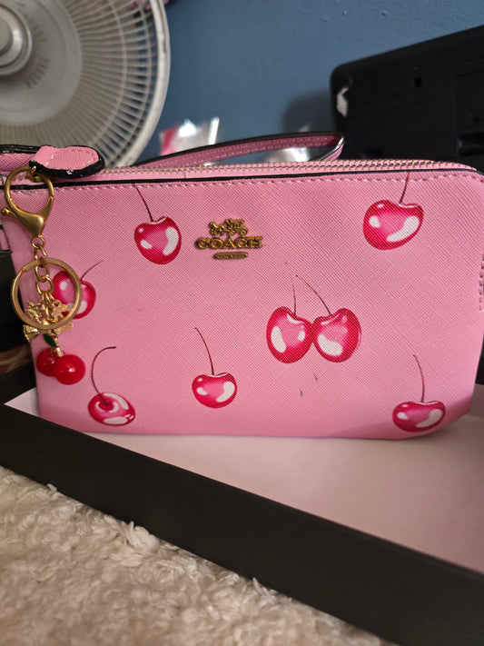 Cartera mano coach
