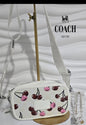 Cartera viajera coach